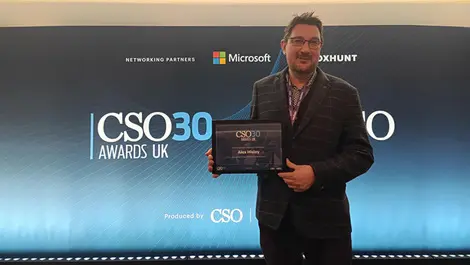 Alex hisley collecting cso30 award